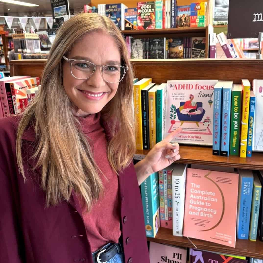 Grace Koelma in bookshop with her book